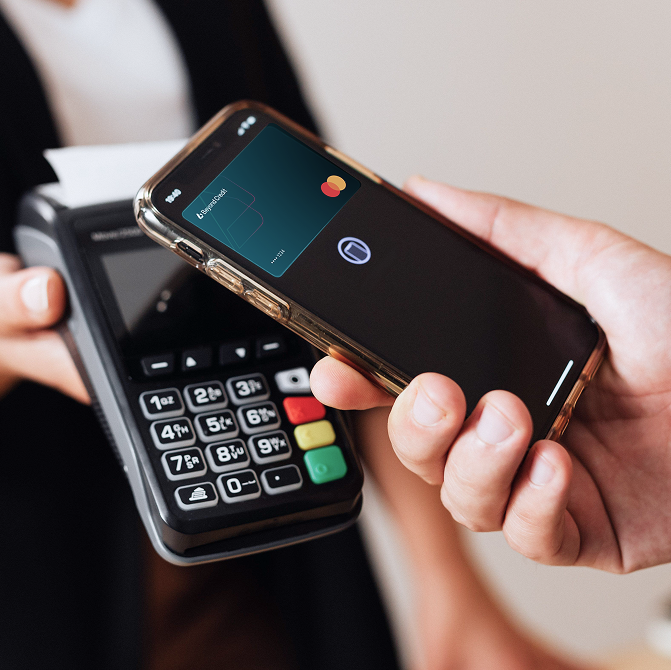 a phone with a digital Beyond Credit card tapping to pay